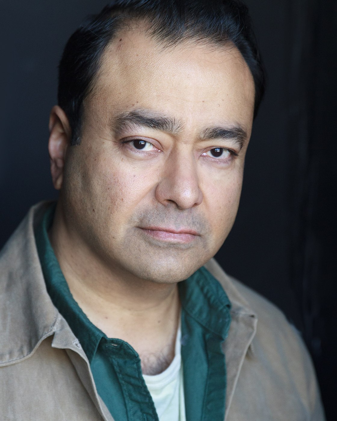 Gautam Kannan, clean-shaven theatrical headshot
